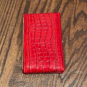 Red patent crocodile clutch